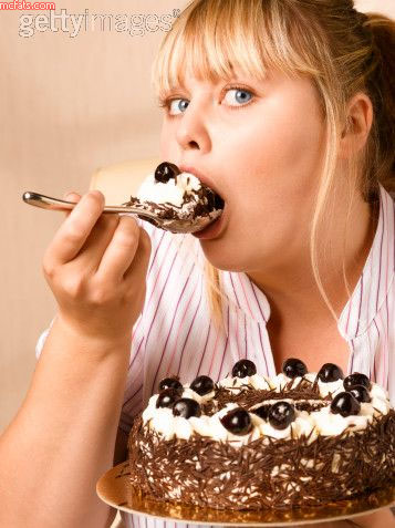 girl-eating-cake_mcfats_com.jpg